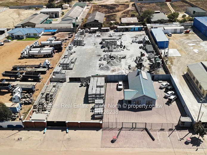 Commercial property sitting on +4000 sqm. Walled, gated, paved and a security booth. An office block